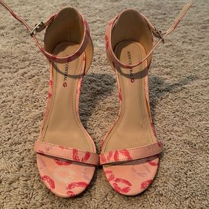 Pink heels with lips on them size 8.5 body central worn once inside only
